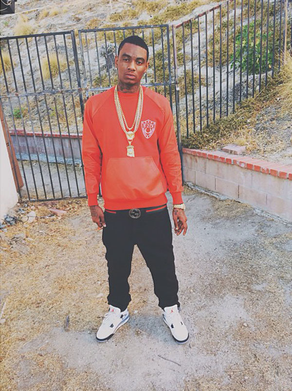 Soulja Boy wearing Air Jordan 4 IV Retro Cement