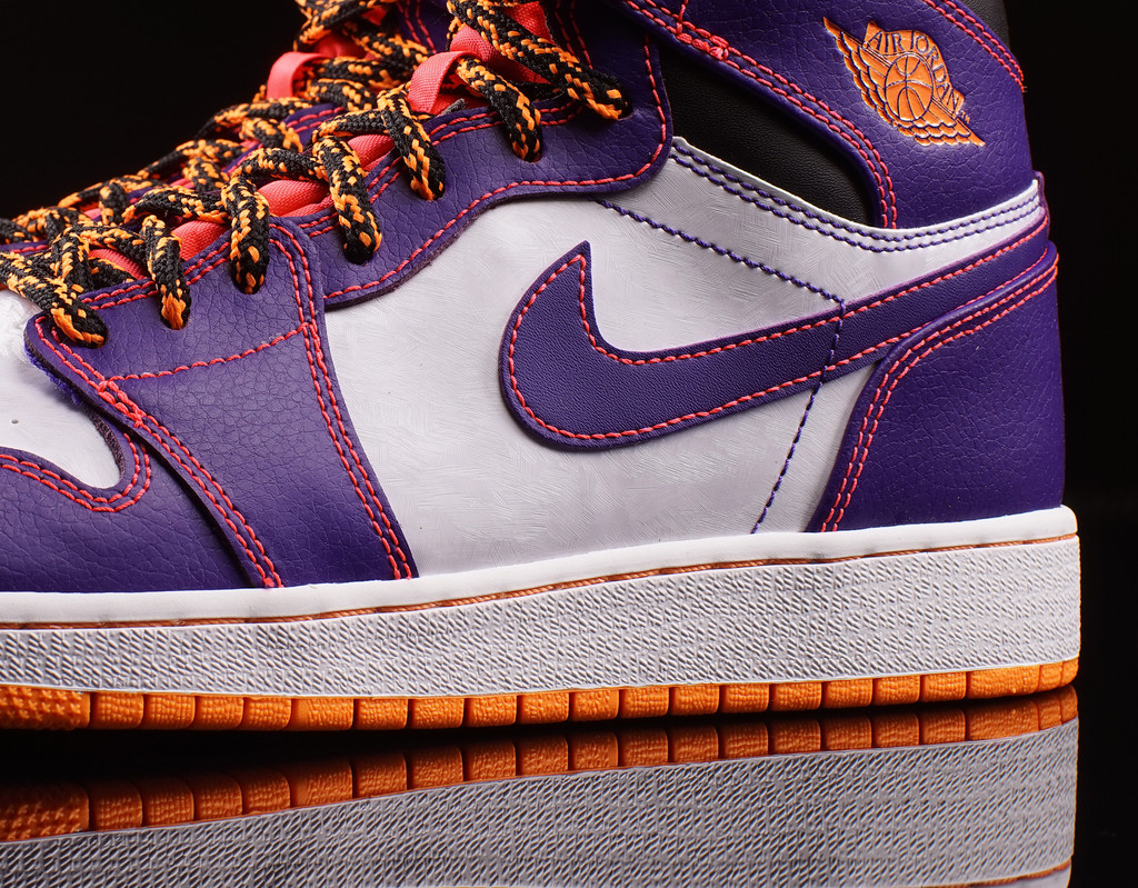 purple and orange jordans 1