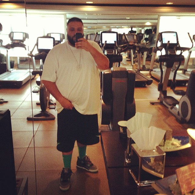 DJ Khaled wearing Air jordan 4 Green Glow