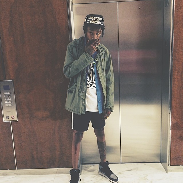 Wiz Khalifa wearing Air Jordan I 1 Shadow