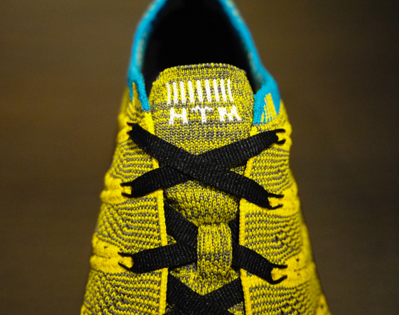 Nike Free Flyknit HTM SP in Tour Yellow Light Charcoal Neo Turquoise tongue
