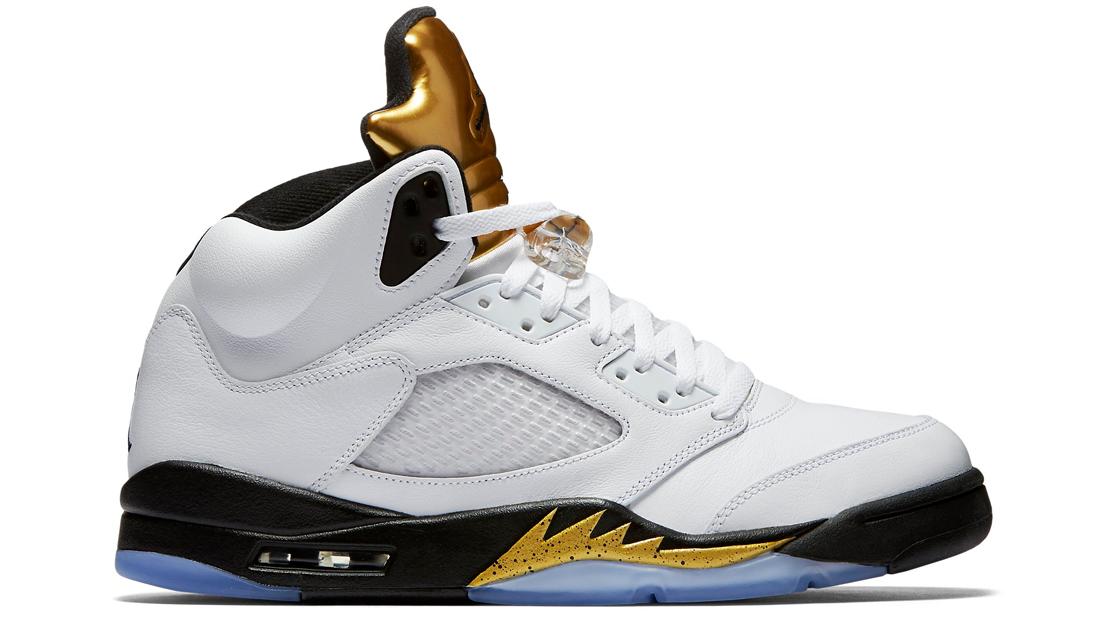 gold and black jordan 5