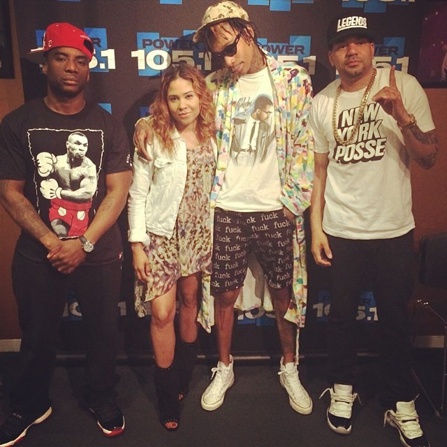 Charlamagne wearing Air Jordan XI 11 Bred; DJ Envy wearing Air Jordan XI 11 Low Concord