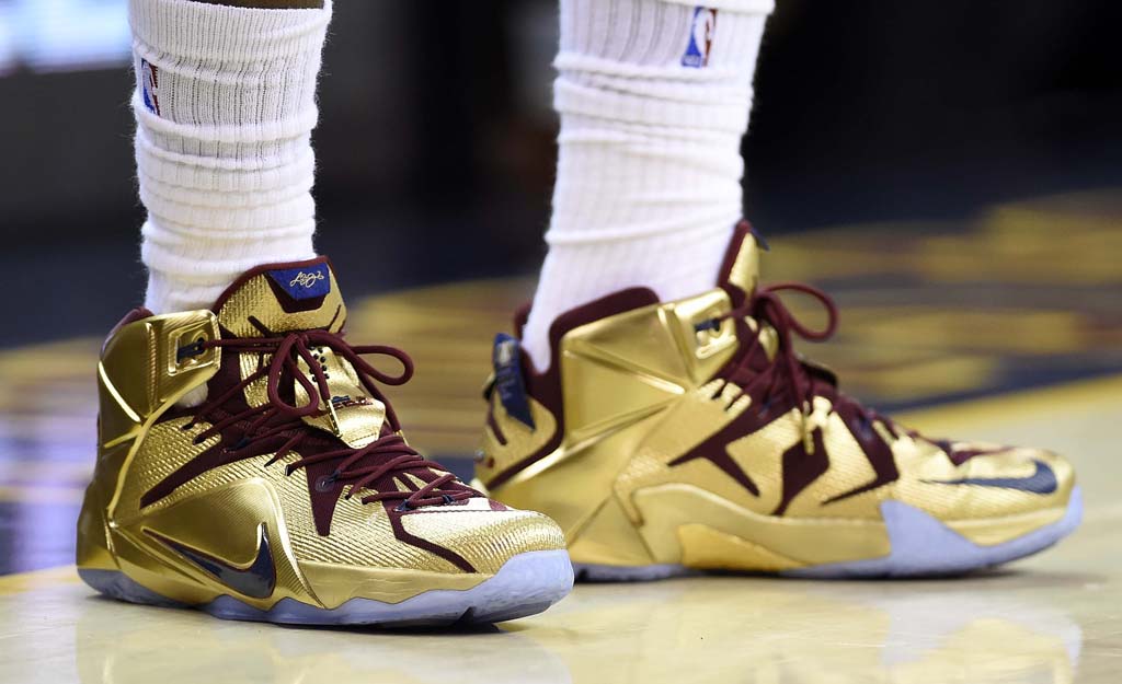 LeBron James wearing a Nike LeBron XII 12 Gold Finals PE