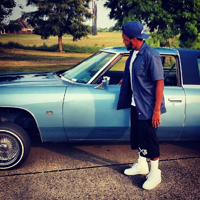 Currensy wearing Nike Air Force 1