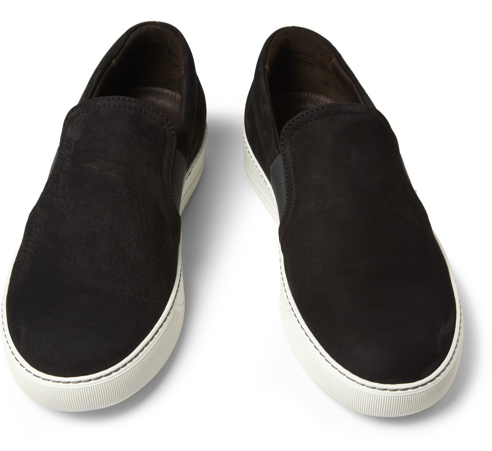 black slip on shoes with white soles