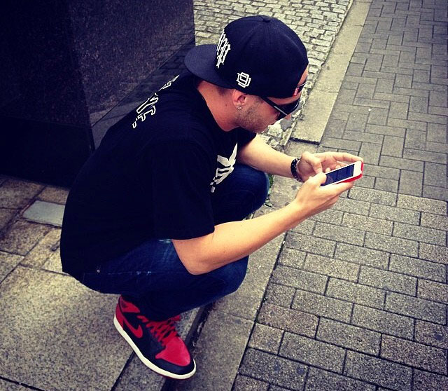 Nick Hogan wearing Air Jordan I 1 Bred