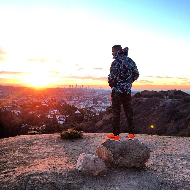 The Game wearing Nike Flyknit Lunar 1 Total Orange