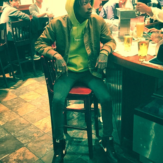 Wiz Khalifa wearing Supreme x Nike Air Force 1 High