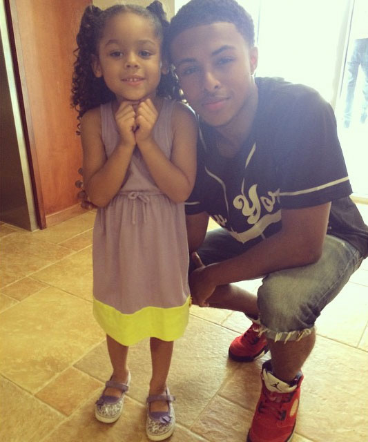 Diggy Simmons wearing Air Jordan V 5 Toro