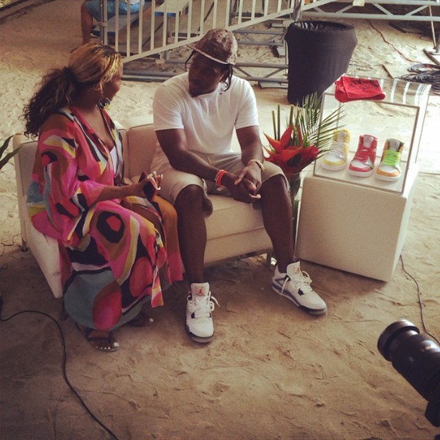 Pusha T wearing Air Jordan IV 4 Cement