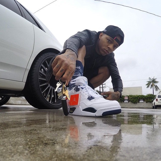 Bow Wow wearing Air Jordan IV 4 Legend Blue