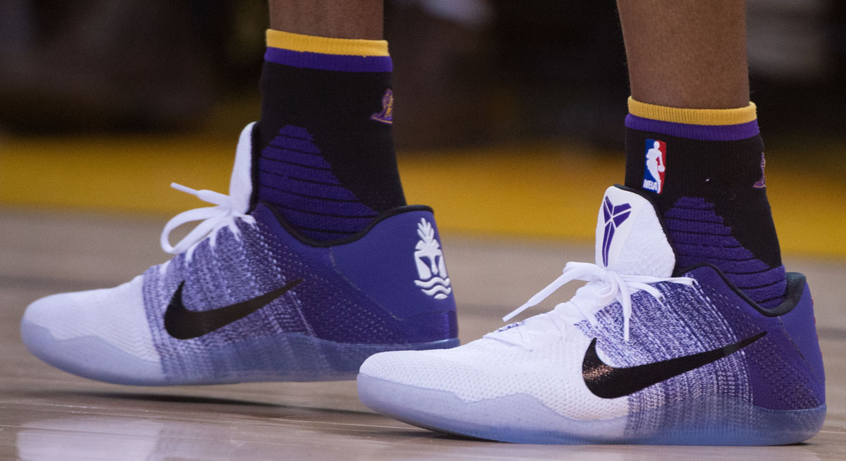 kobe 11 purple and white