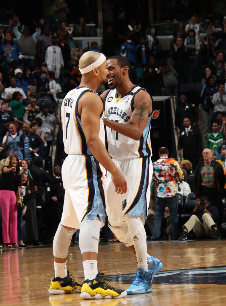 Mike Conley wearing adidas Rose 3.5 Triple Blue; Jerryd Bayless wearing adidas Top Ten 2000 Rivalry Pack