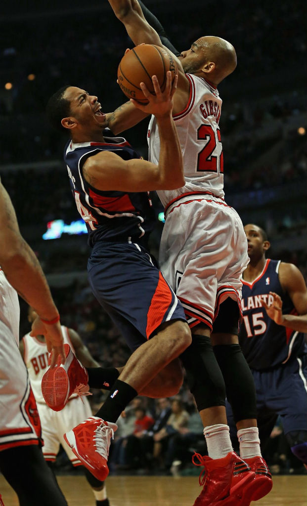 Devin Harris wearing adidas adizero Shadow; Taj Gibson wearing adidas Rose 773 Light