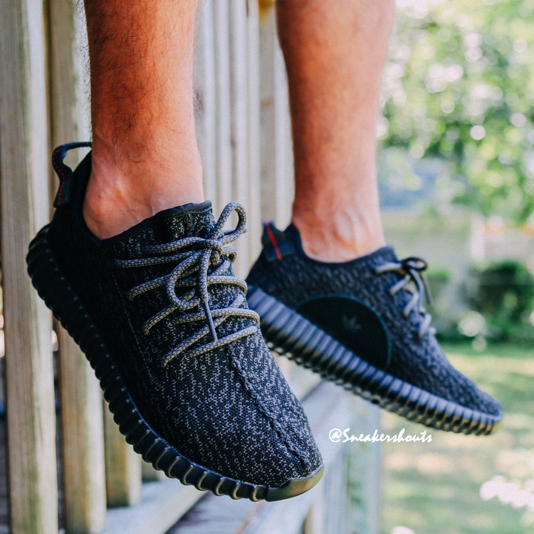 yeezy black on feet