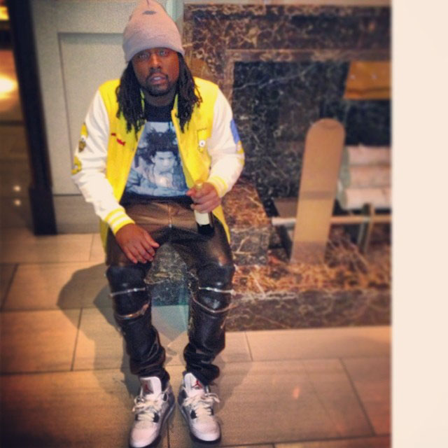 Wale wearing Air Jordan 4 Retro Cement