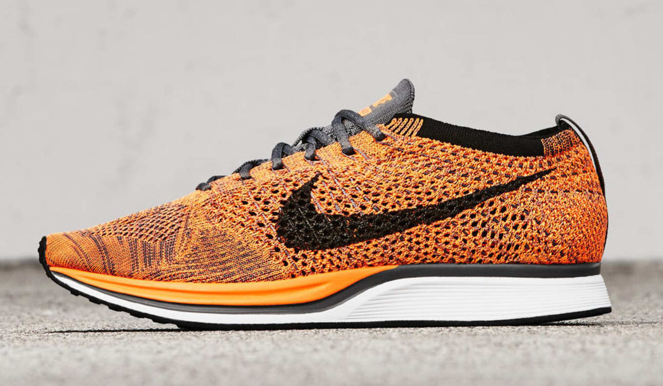 orange flyknit nike