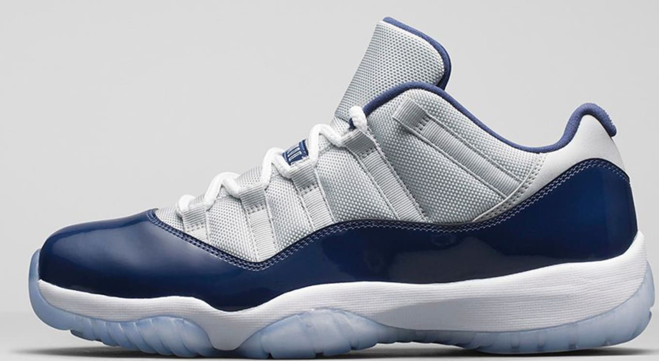 blue and white jordan 11 low