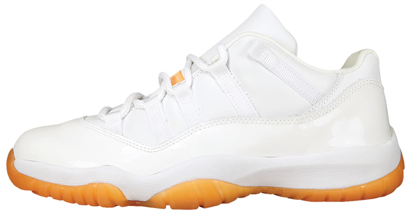 orange and white low top 11s