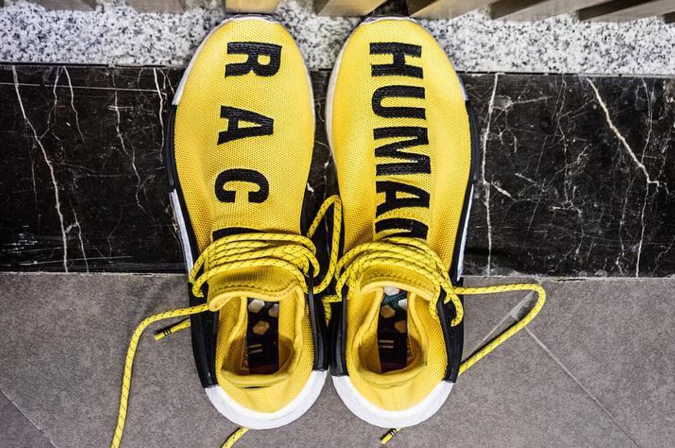 human race yellow adidas