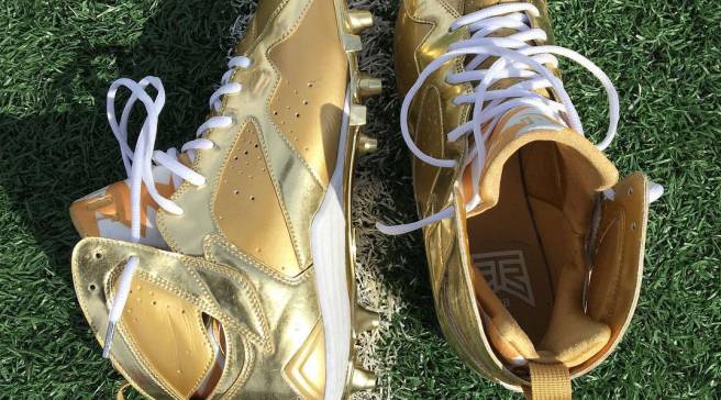 gold jordan football cleats