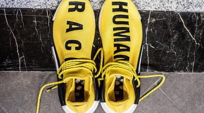 yellow human race shoes