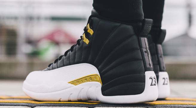 gold and black jordan 12s