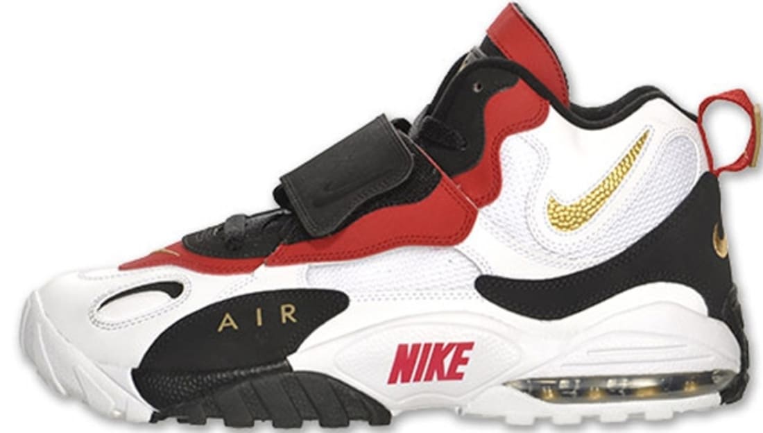 black and gold nike turfs