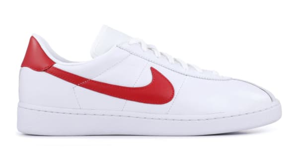 white leather nike with red swoosh