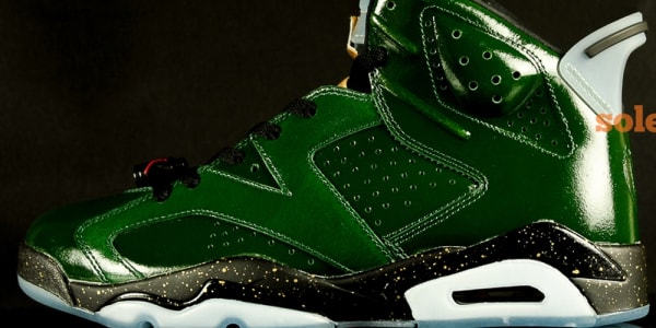 gold and green jordans