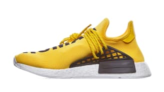 human race yellow sneakers