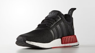 nmd all black with red