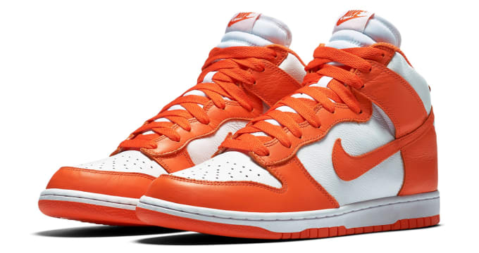 orange and white nike dunks
