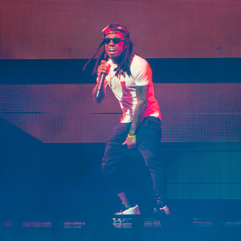 Lil Wayne wearing Air Jordan XIV 14 Black Toe
