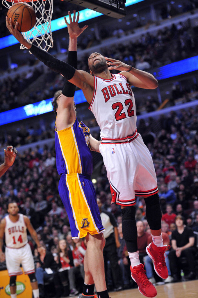 Taj Gibson wearing adidas Rose 773 Light Red White