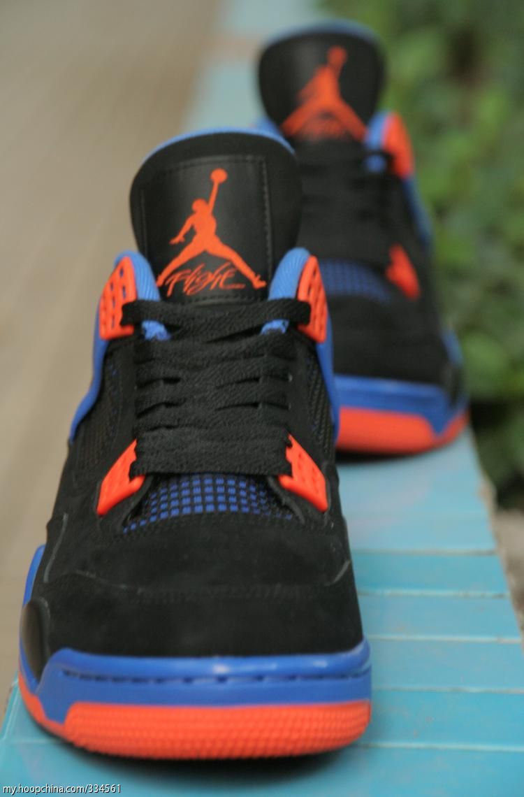 Black blue and shop orange jordan 4s