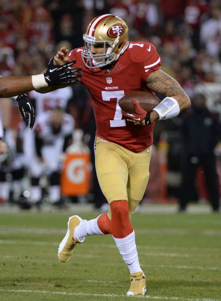 Colin Kaepernick wearing Air Jordan 12 PE Cleats (1)