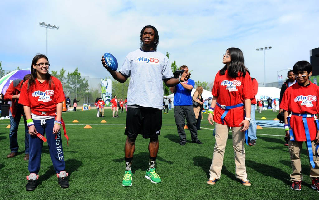 Robert Griffin III wearing adidas adiZero Sonic 3 Prime Green Electricity G47182 (3)