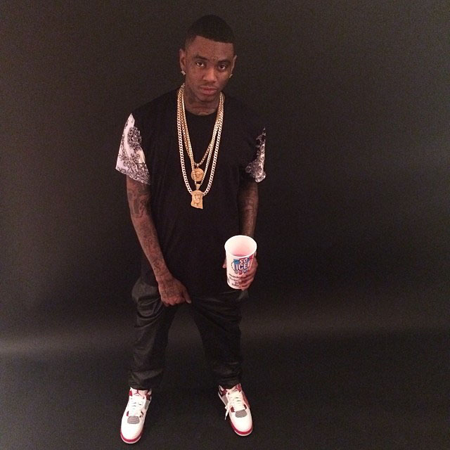 Soulja Boy wearing Air Jordan 4 Retro Fire Red