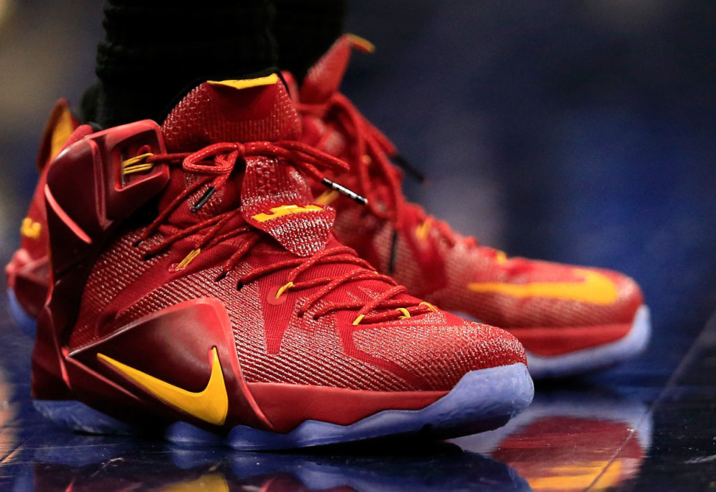 LeBron James wearing Nike LeBron XII 12 Red/Yellow PE on November 21, 2014