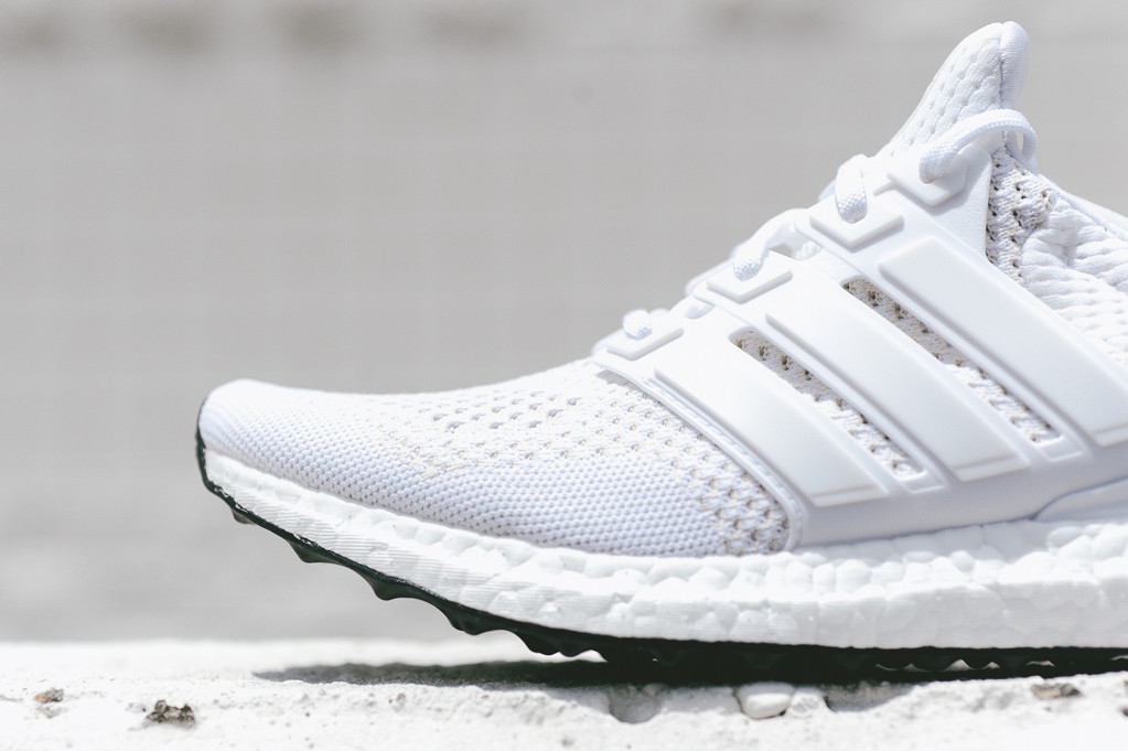 white ultra boost with black sole