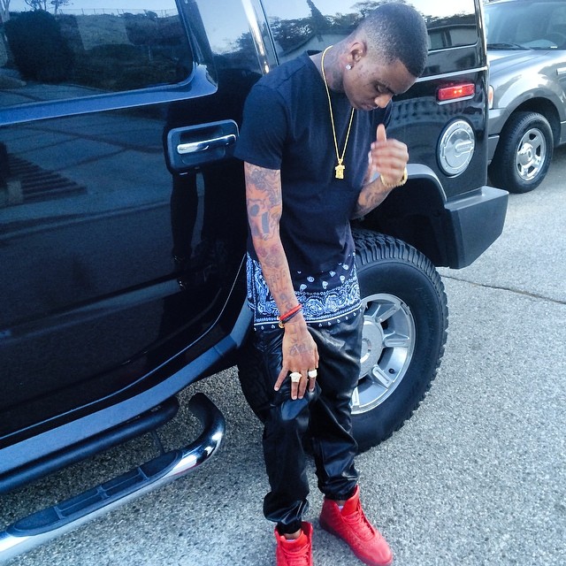 Soulja Boy wearing Jordan Shine Red