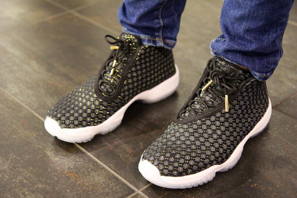 black and gold jordan future