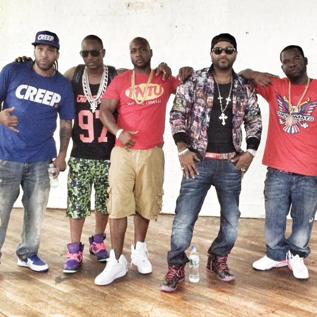 Cam'ron wearing Nike Air Revolution Electric Purple; Jim Jones wearing Air Jordan X 10 Doernbecher