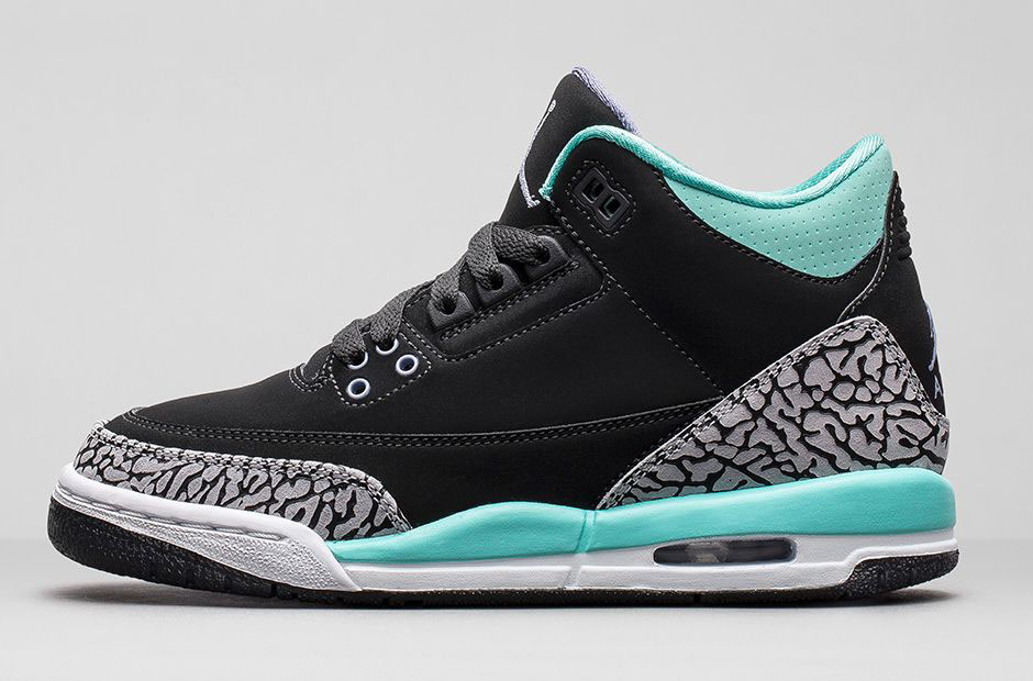 black and turquoise jordans