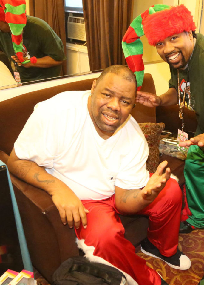 Biz Markie wearing Run DMC x Keith Haring x adidas Originals Superstar 80s Christmas in Hollis