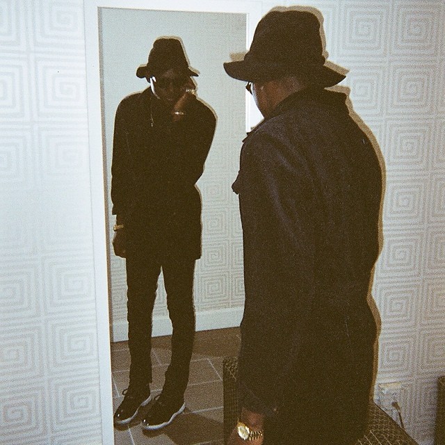 Theophilus London wearing Air Jordan 11 Black Red