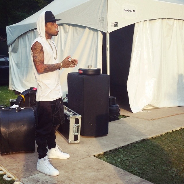 Kid Ink wearing Air Jordan I 1 Mid White