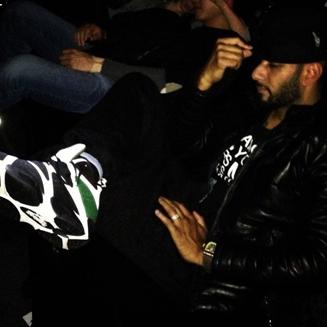 Swizz Beatz wearing Reebok Kamikaze Sonics